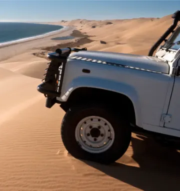 Samochód terenowy na wydmie na pustyni Namib w Namibii